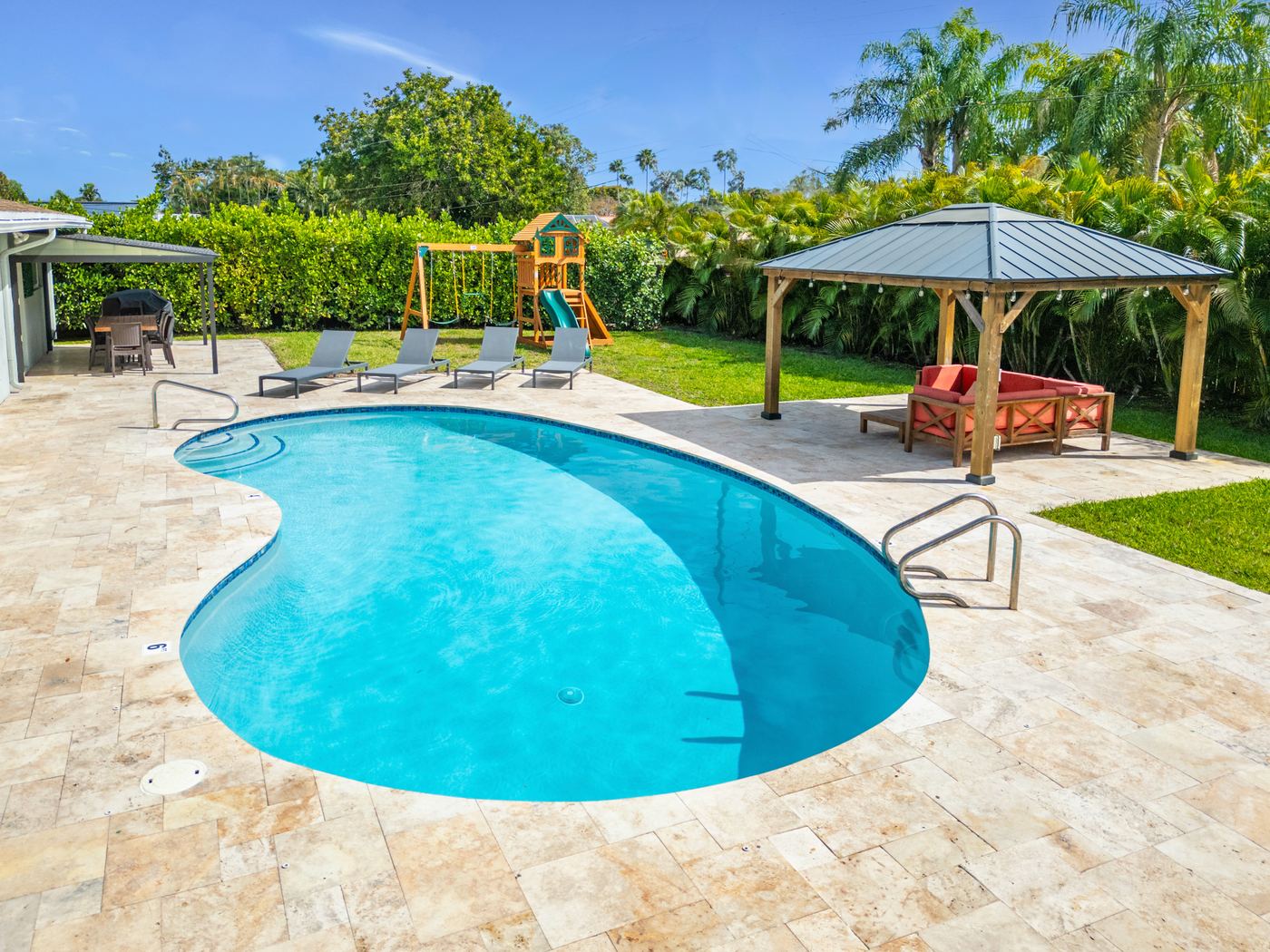 Backyard pool at a StayRnR property in South Florida